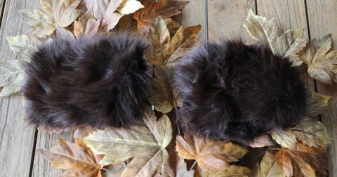 Hovedbilde Pulsvarmer i fuskepels - m&oslash;rk brun